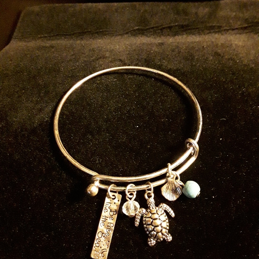 Silver bracelet with 5 charms
